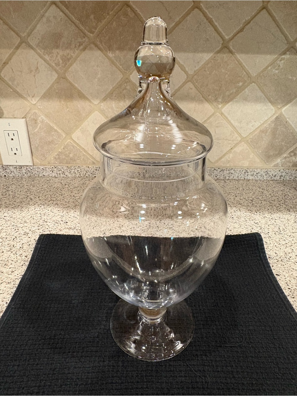 Clear glass apothecary jar classic pedestal base / distinct finial-topped lid